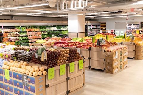 Fruit and vegetables on display at Whole Foods Market, One Wall Street